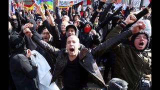 Riot police with water cannons are called in as far-right protesters hijack Brussels peace march