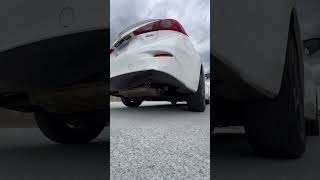 Exhaust Outside the 2014 Mazda3 i Touring