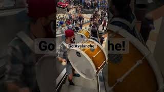 Riding the escalator with the drum line! Colorado Avalanche #worldchamps￼