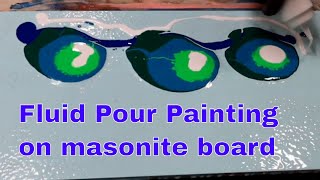 acrylic fluid pour painting seafoam on Masonite