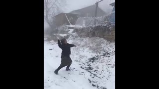 Babushkas calling for their friend to come out and play in the snow