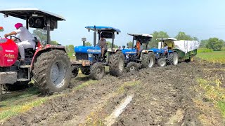 4 Tractors VS Trolley in muddy field