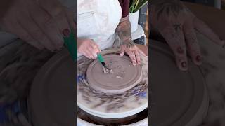 Trimming a plate #ceramicplate #trimmingpottery #clay #dinnerware #handmade #october #fall #plates