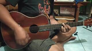 strumming test handmade mahogany acoustic guitar