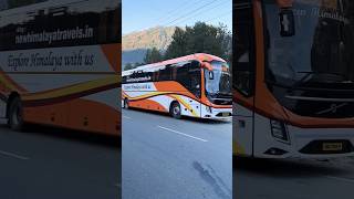 ULTRA LUXURIOUS ORANGE VOLVO 9600S HOLIDAY SLEEPERBUS ON INDIAN HIGHWAY.