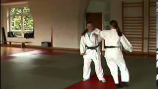 Ushiro-eri-dori Kote-hineri-koshi-nage