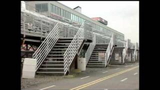 Newsman falls down stairs