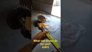 UPS threw fragile package over 6 foot fence