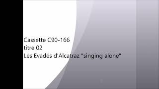 C90-166 02 Les Evadés d'Alcatraz "singing alone"