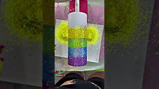 Woman explains her process of making a rainbow pride tumbler!