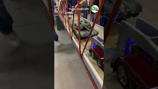 RC tractor trailer trucks crossing the bridge at Cabin Fever Expo