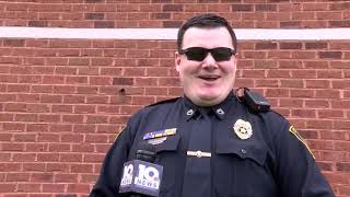 Photo of Lynchburg police officer sharing meal with homeless man goes viral