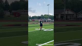 Police officer plays football