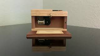 You can buy this wooden Leica camera music box for $10