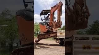 unloading Hitachi 20