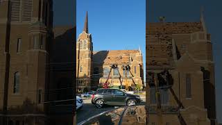 Old shingles being torn off First Lutheran Church of Albert Lea Minnesota