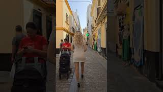 4k Granate styling walking in public, touristic sightseeing #Cadiz, #Espana, minidress, stockings