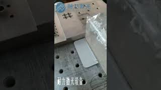 Nority Laser fiber marking machine to engrave QR codes on plastic surfaces.