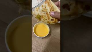 Tortilla Wrap dipped in yellow melted cheese yummyyyyy #wrap #cheese #yellow #melted