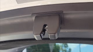 How to remove the plastic trunk latch cover for a Tesla Model Y