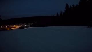 Flood-lit, late afternoon skiing