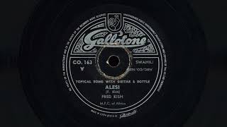 "Alesi" - Fred Kish (1957) - Congolese guitarist with glass bottle accompaniment