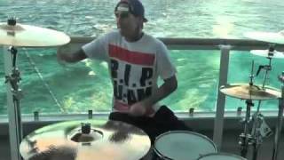 Travis Barker drumming in the middle of the Atlantic Ocean