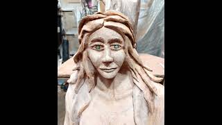 Making Faces - Carving a mermaid in a Live Oak