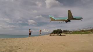 Ikar (Pegas Fly) landing at Phuket Airport "Mai Khao Beach - Airport viewpoint"