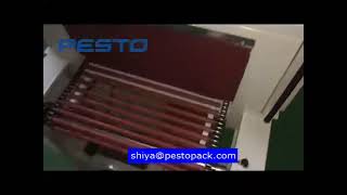 Automatic film sealing cutting and shrink wrapping machine