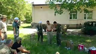 Third Wave Volunteers making the #ukraine soldiers laugh during training.