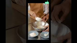 Adding Egg to Flour in Mixing Bowled #10minutes #recipe #shorts