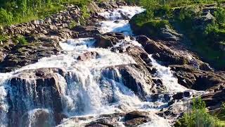 Waterfalls, Snow-Capped Mountains, Fjord and Deep Blue Sea