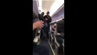 Man Gets Dragged of Airplane forced!!!