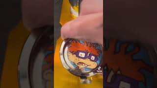 DIY upcycled buttons from retro Rugrats book button press maker