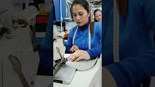 She is Sewing JUKI Overlock Machine