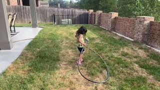 Potential Future Firefighter Shows Off Hose Handling Skills