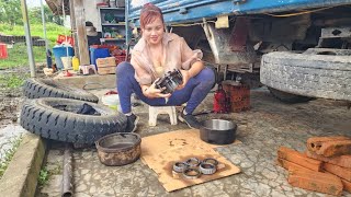 Genius girl repairs and restores car wheels.