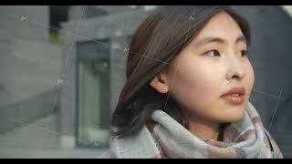 Close-up of woman face. Portrait of a beautiful young Asian woman standing against the background of