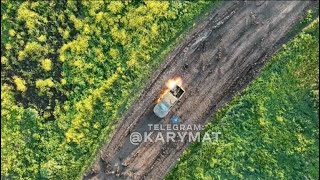 Ukraine drone drops an incendiary bomb on a Russian vehicle