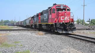 Transferring hoppers to the Decatur and Eastern Illinois RR, GP38-2s and SD40s