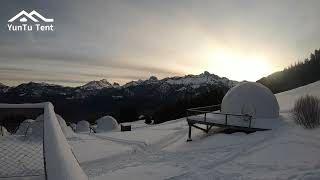 Glamping Geodesic Igloo Dome Tent In the Snow Mountain