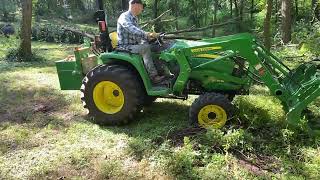 John Deere Tractor 3038E   GRAPPLE TACKLES REMOVING 2 STUMPS!!!