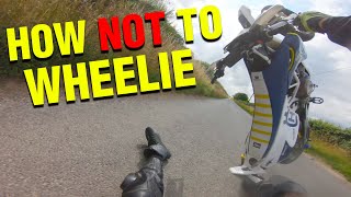 HOW NOT TO WHEELIE (HUSQVARNA 701 MOTORCYCLE CRASH)