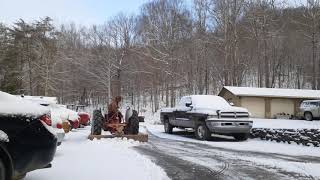 Ford Jubilee tractor plowing snow