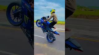 v3 wheelie bike stunt on street