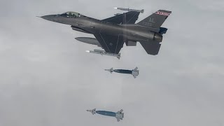 F-16 Fighting Falcons Conduct Bomb drop training on military vehicles