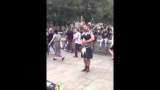 Street musician performing at Trafalgar Square,London