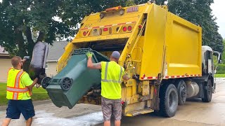 Yellow West Allis Peterbilt 320 Heil Rear Loader Garbage Truck