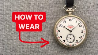 How to wear a pocket watch on a leather strap with a fob.